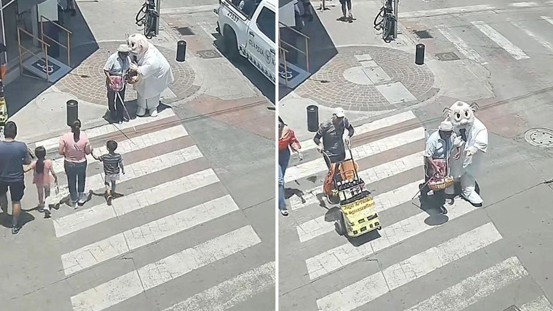 Captan a botarga del Dr Simi ayudando a un invidente a cruzar la calle en Irapuato